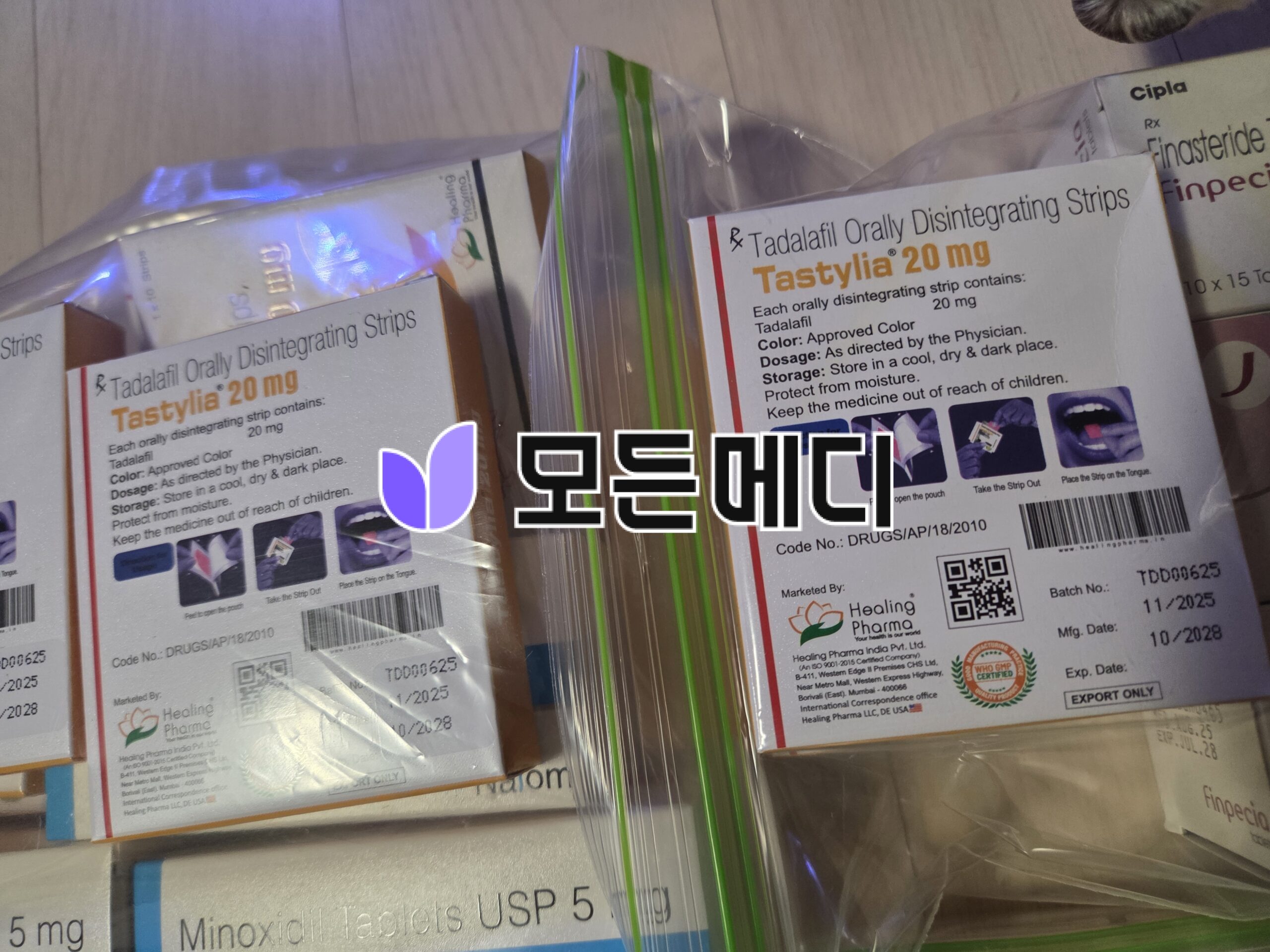 Boxes of tadalafil Tastylia 20 mg orally disintegrating strips on a shelf, with labels and QR codes visible
